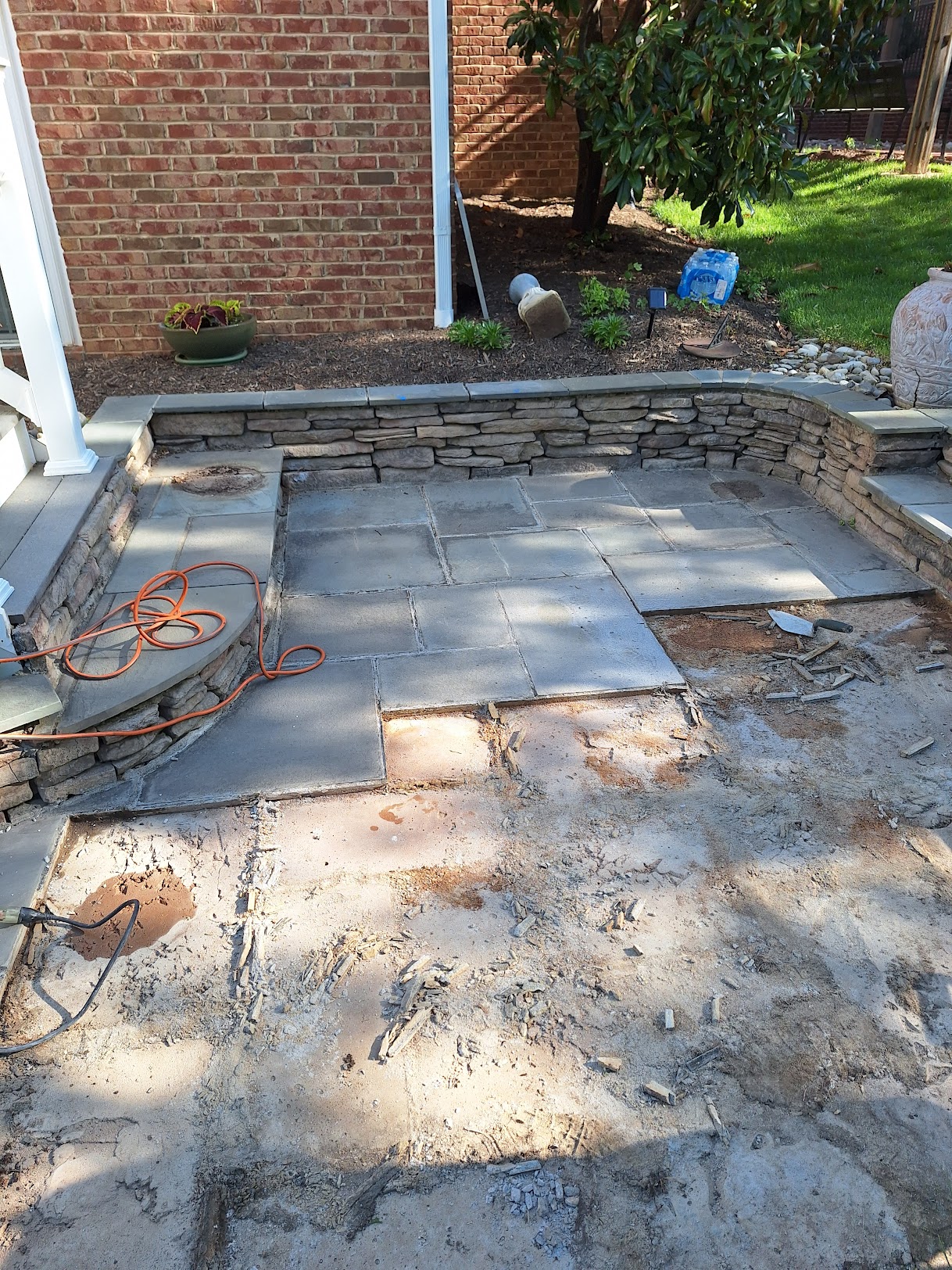Patio demolition before nhomeimprovement masonry rebuild